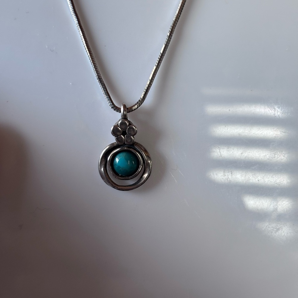 Sterling silver necklace with turquoise pendant
